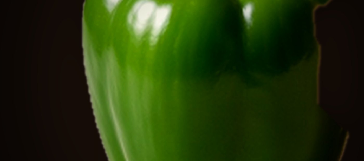 A capsicum ripening on the plant.